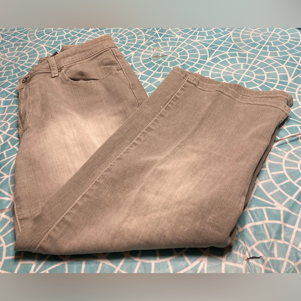 Chico’s Platinum gray distressed denim capris.